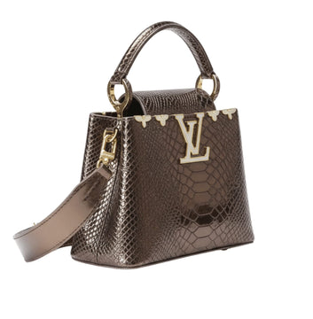 Louis Vuitton | Capucines Handbag In A Metallic Python Or Alligator - Free & Fast UAE Shipping